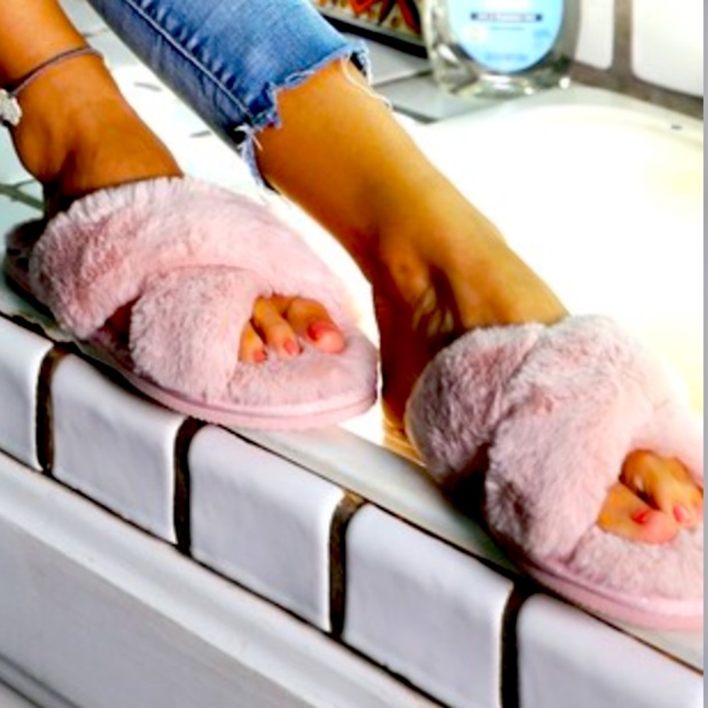 Pink fuzzy slippers